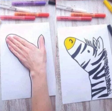 zebra drawn by drawing around the hand on the paper
